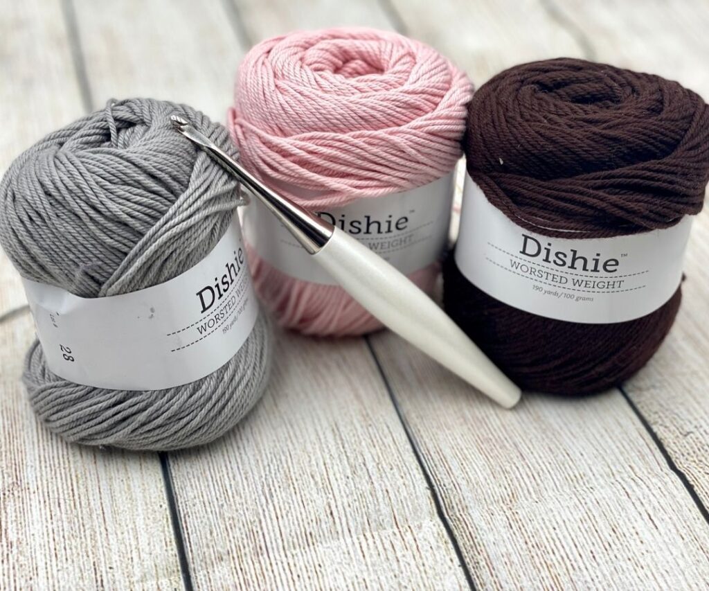 Dishie yarn and Furls Odyssey crochet hook