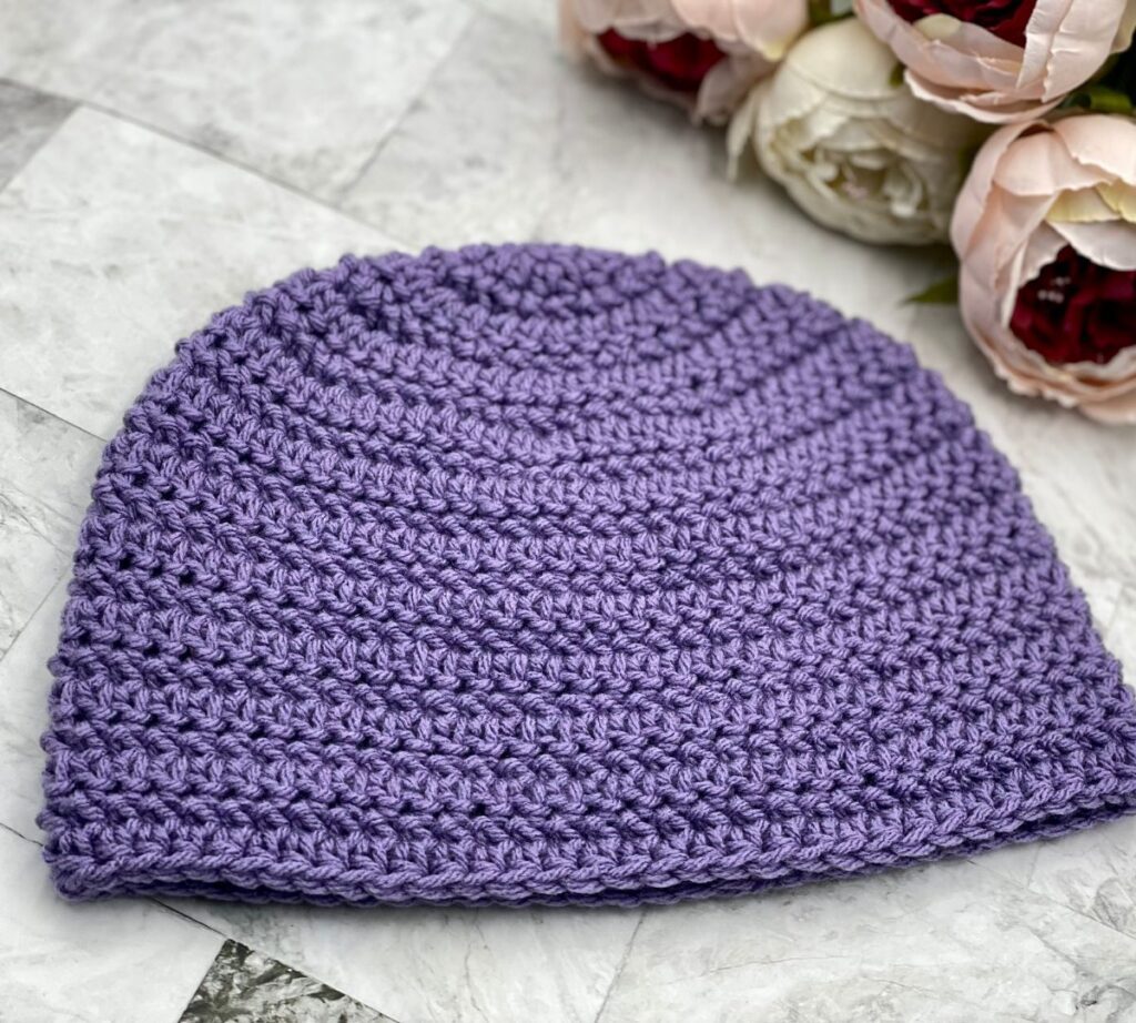 Purple crochet charity beanie free pattern with flowers